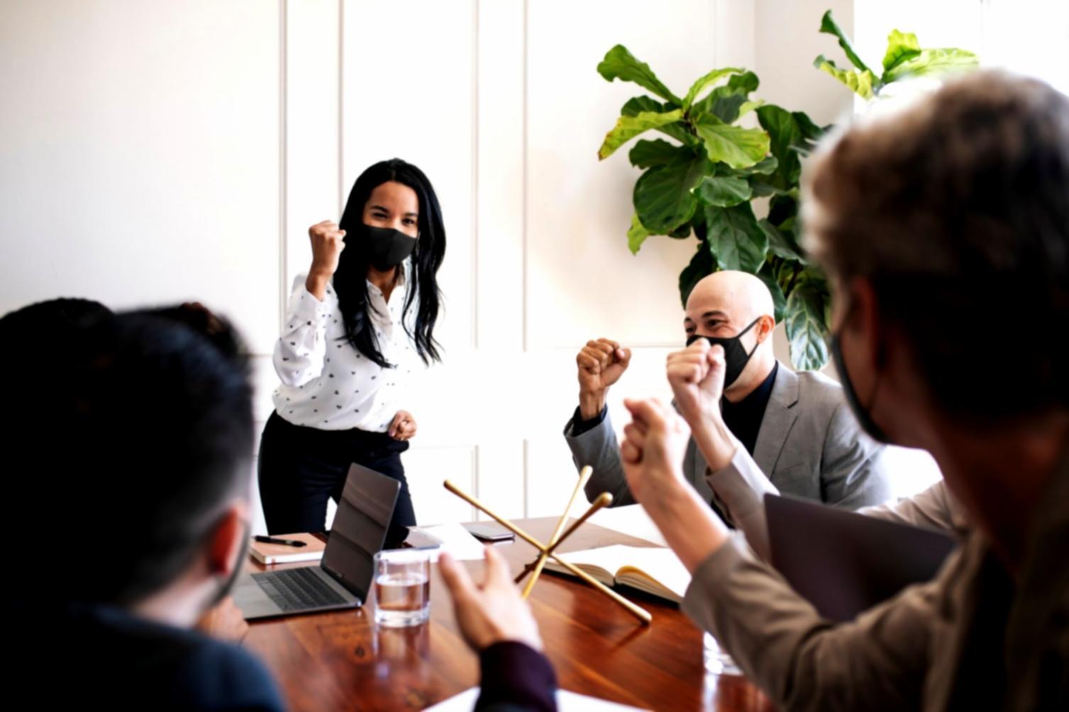 Business team reviewing improved financial processes and digital workflow systems